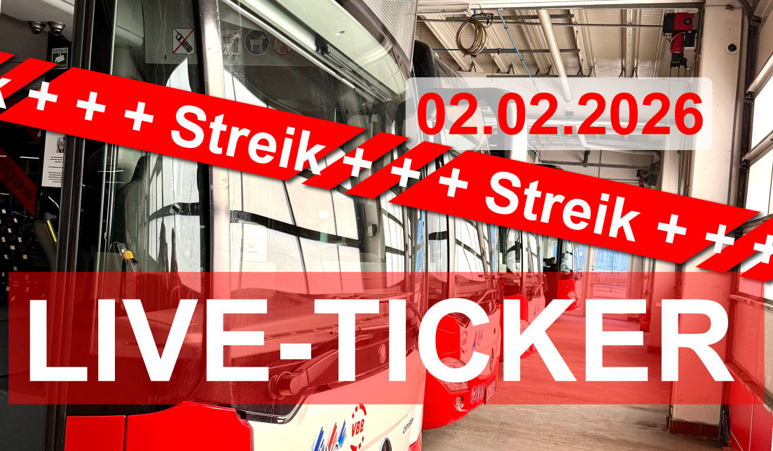 Stehende Busse in Wagenhalle,. Banner mit 02.02.2026, Streik und LIVE-TICKER